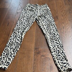 Sunzel. Animal print leggings. Never worn. Full length.